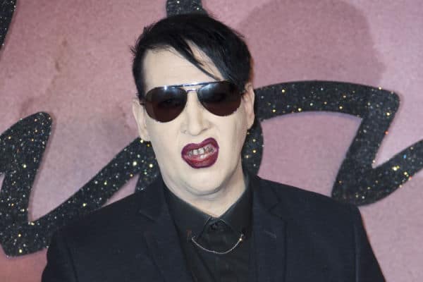 Marilyn Manson fined for blowing nose on concert camerawoman - BBC News