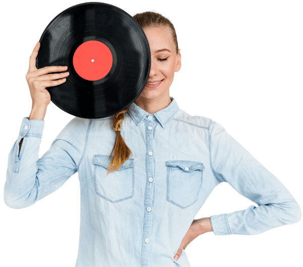 young woman holding an lp record to her face